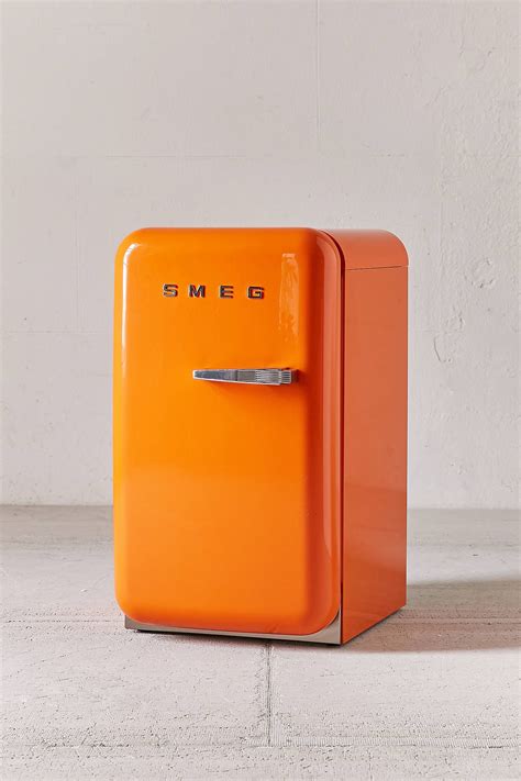 yellow smeg fridge freezer.